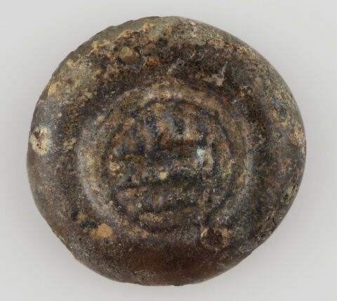 Disque au nom du calife fatimide al-Hakim (r. 996-1021), image 1/2