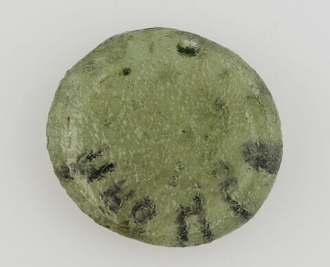 Disque au nom du calife fatimide al-Hakim (r. 996-1021), image 1/1