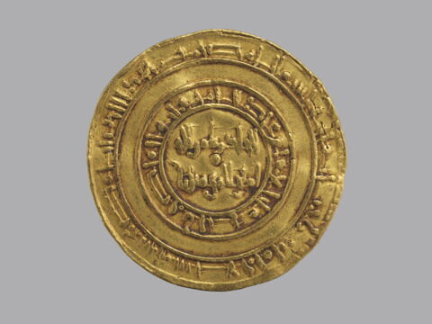 Dinar au nom du calife fatimide al-Hakim (r. 996-1021), image 1/4