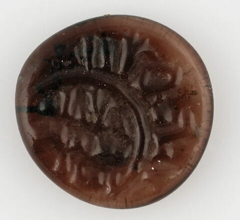 Disque au nom du calife fatimide al-Hakim (r. 996-1021), image 1/2