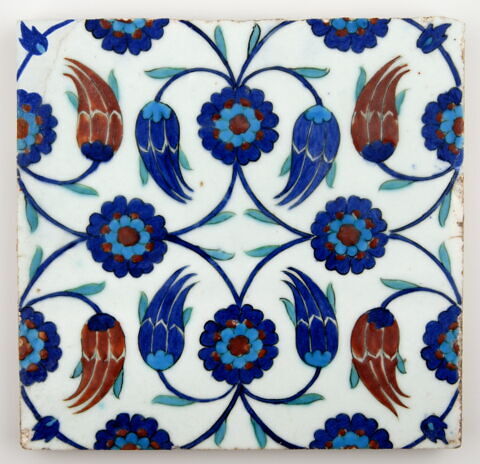 Carreau à rosettes et tulipes issues de tiges formant des losanges, image 2/2