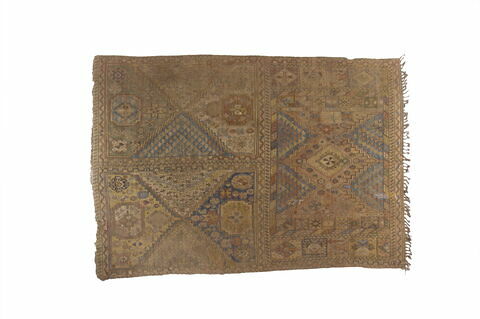 Fragment de tapis à décor de motifs géométriques