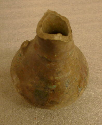 Bouteille fragmentaire, image 1/2