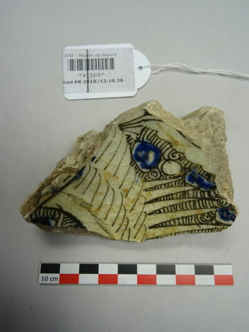 Fragment de fond de vaisselle, image 1/2