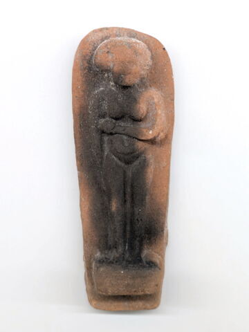 figurine féminine couchée
