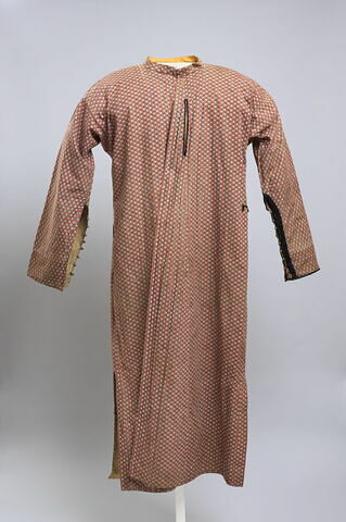 Robe en coton imprimé rayures rouges et blanches à palmettes et doublée coton beige (doublure du col orange)