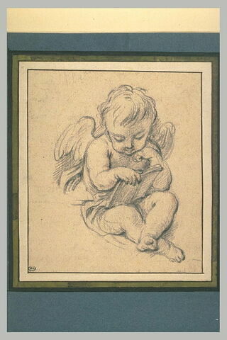 Un ange assis lisant un livre placé sur ses genoux, image 1/1