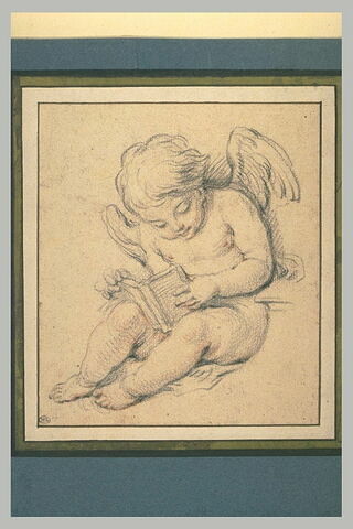 Un ange assis lisant un livre placé sur ses genoux, image 1/1