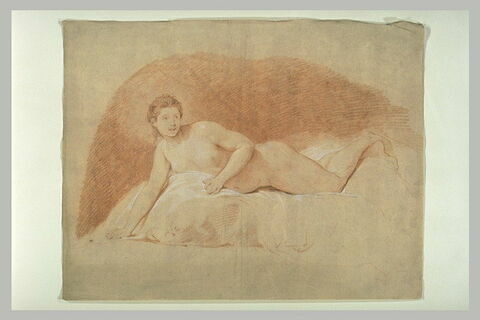 Jeune femme nue, allongée sur un lit, image 1/1