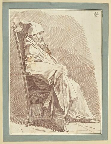 Homme vêtu d'un manteau, coiffé d'un bonnet, assis