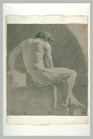 Un homme assis, tourné à droite, et vu de dos, image 2/2