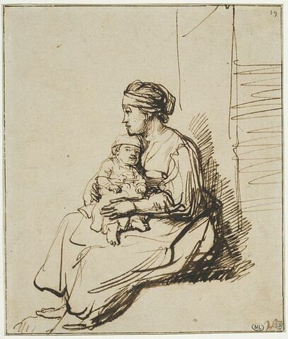 Jeune femme assise tenant son enfant sur ses genoux