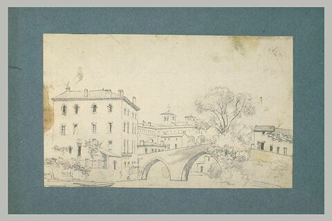 Maisons au bord d'une rivière, dans une ville, image 1/1