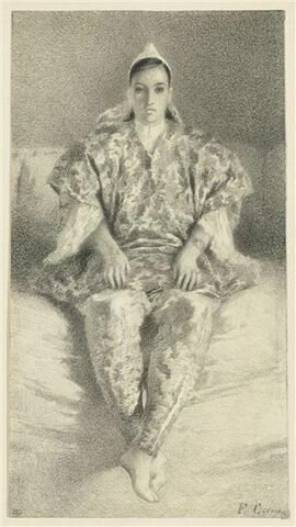 Femme algérienne, de face, assise sur un divan, image 1/2