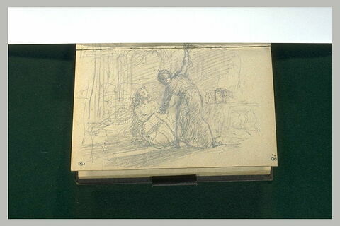 Femme agenouillée devant un homme menaçant, image 1/2