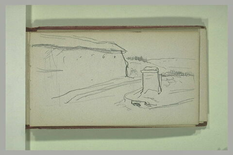 Paysage avec un bâtiment longeant la route, image 1/1