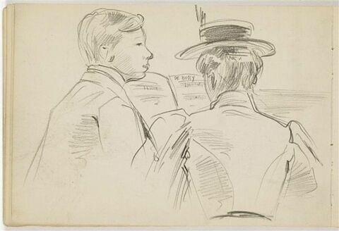 Une femme, de dos, et un jeune homme, devant une partition de Debussy, image 1/2