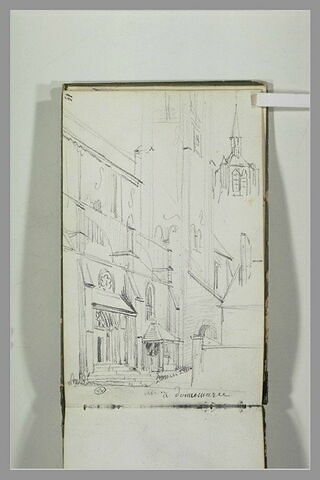 Vue d'une rue débouchant sur une église à Donnemarie, image 2/2