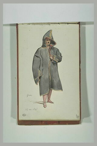 Un grec portant un manteau à capuche