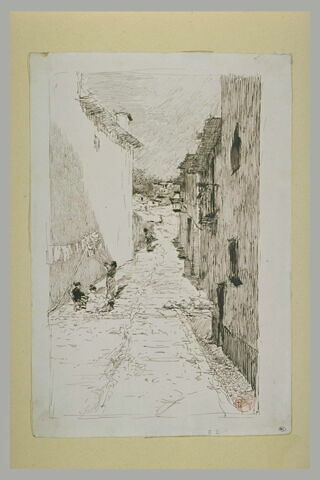 Ruelle d'un village où trois femmes étendent du linge, image 1/1