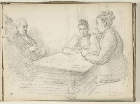 Quatre personnes jouant aux cartes dans un intérieur