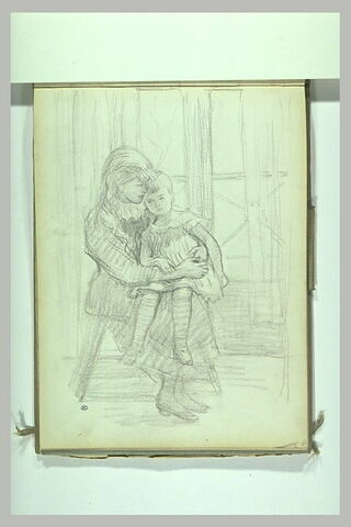 Jeune fille assise, tenant un enfant assis sur ses genoux, image 2/2