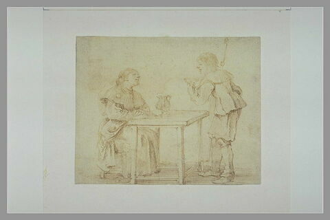 Un homme et une femme conversant à une table
