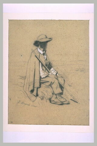 Homme assi, coiffé d'un chapeau à larges bords, image 2/3