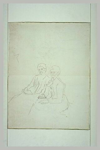 Deux femmes assises côte à côte dont une tient une lettre, image 1/1