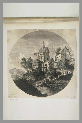 Village sur une colline dans un paysage de montagnes, image 2/2