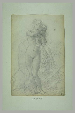 Jeune femme nue embrassant le bébé qu'elle tient contre elle, image 1/1