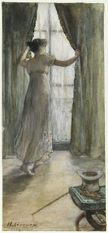 Jeune femme debout, vue de dos, devant une fenêtre