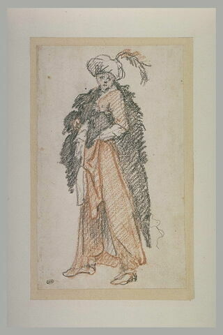 Personnage debout, coiffé d'un turban, image 2/2