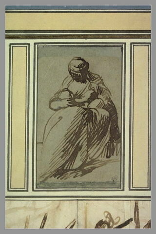 Jeune femme assise, de face, allaitant son enfant, image 1/1