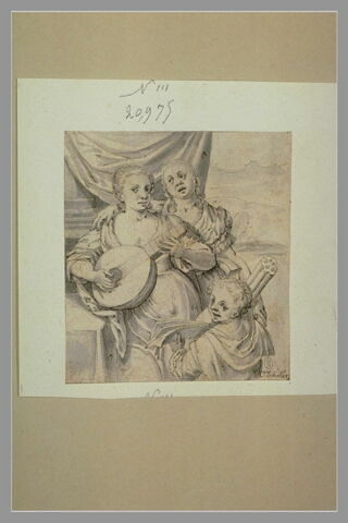 Deux jeunes filles faisant de la musique et un jeune enfant, image 3/3