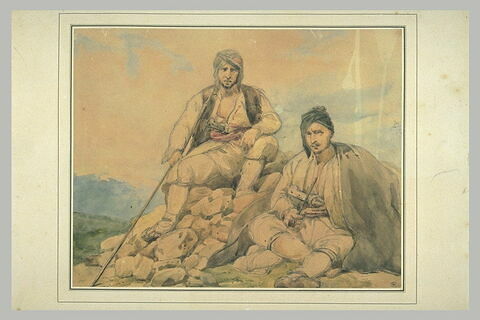 Deux bergers assis sur un amoncellement de pierres