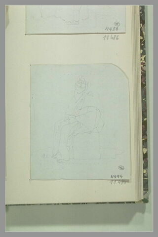 Femme, coiffée d'un voile, assise sur une pierre, image 1/1