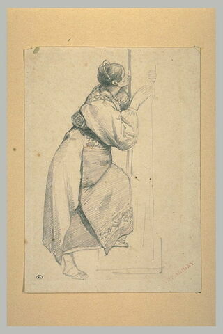 Paysanne d'Italie du sud, debout, de profil à droite, embrassant le pied d'une croix (?)