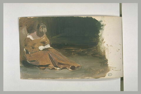 Femme assise lisant