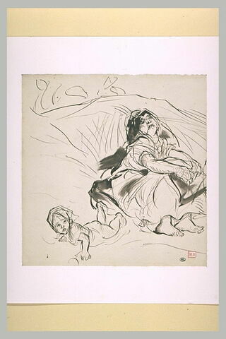 Femme orientale, assise sur le sol, et enfant couché à plat ventre, image 2/2