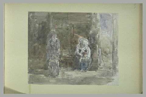 Deux femmes et deux enfants se tenant contre un mur, image 1/1