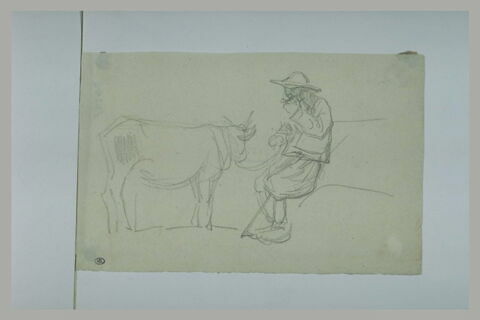 Breton, assis sur un tertre, tenant la longe d'une petite vache, image 1/1
