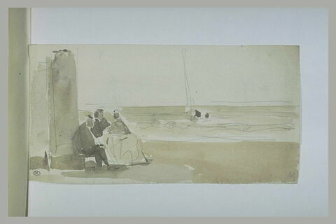 Un homme et deux dames, assis, près d'une cabine, sur une plage