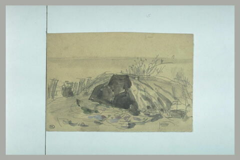 Excavation dans un rocher, sur une dune, image 1/1