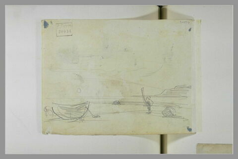 Grève : canot échoué et un homme, un long instrument à la main, image 1/1