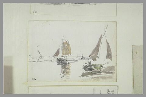 Deux barques de pêche, dont l'une est échouée, image 1/1