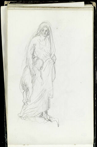Femme portant un enfant, image 1/2
