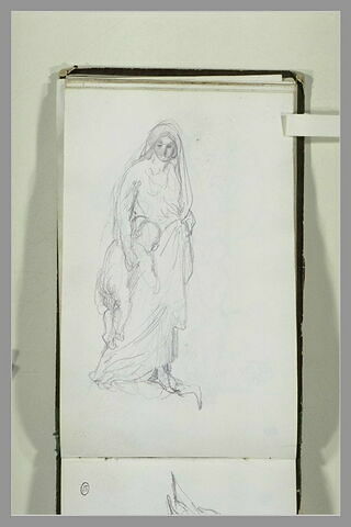 Femme portant un enfant, image 2/2