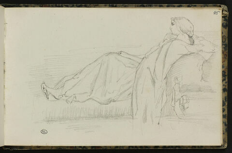 Jeune fille allongée sur un canapé, image 1/1
