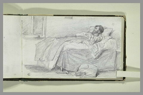 Homme dormant dans un lit, image 2/2